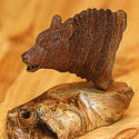 Wood carving of a grizzly bear by Bill Jons