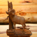 Wood carving of a ram