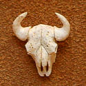 View a larger carved antler tie tack by Bill Jons